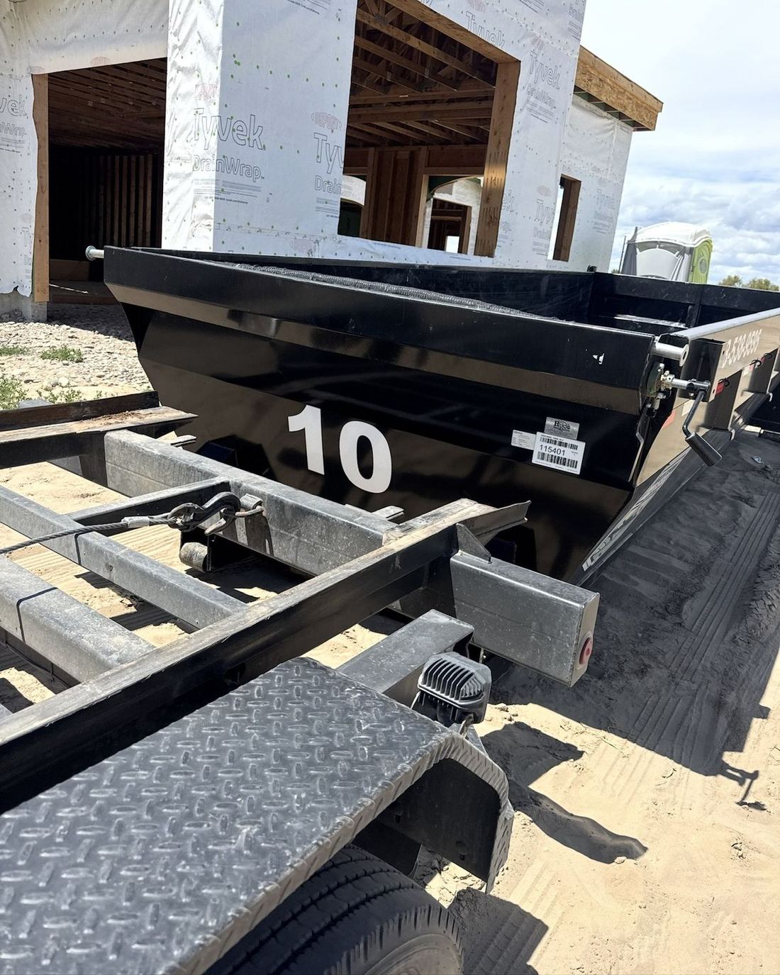 Clean 20-yard roll-off can at a new construction site near Rexburg